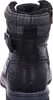 A rear view of a black leather boot with a plaid fabric cuff. Anteprima dell’immagine prodotto