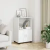 A white cabinet with two doors and an open shelf, decorated with books and vases, placed in a room with a sofa and curtains. Voir les images du produit