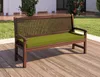 A wooden bench with a green cushion is placed on a wooden deck outdoors, with greenery and a building in the background. Produktbild-Vorschau