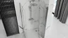 A modern bathroom with a shower enclosure, marble-effect walls, and a black slatted screen. Produktbild-Vorschau