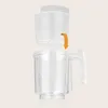 A close-up view of a baby food maker, showing how to assemble two parts. Produktbild-Vorschau