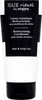 A product shot of a black and white tube of hair conditioner. Produktbild-Vorschau