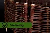 A close-up view of a woven willow garden border, with a green banner overlay containing text and a checkmark. Produktbild-Vorschau