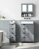 A modern bathroom with grey storage cabinets and a bathtub. Náhled obrázku produktu