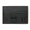 A black pegboard organizer with various hooks and containers mounted on it, displayed against a white background. Náhled obrázku produktu