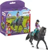 A toy horse and rider set, with the product packaging visible. Voir les images du produit