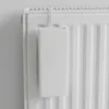 A white ceramic humidifier designed to hang on a radiator. Produktbild-Vorschau