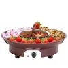 A chocolate fondue set with strawberries, marshmallows, and cookies arranged around a melting pot of chocolate. Produktbild-Vorschau
