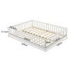 A white wooden children's bed with safety rails, shown with dimensions indicated by text overlays. Náhľad obrázku produktu