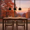 A dining table set for a meal in front of a large window with an autumn landscape view. Náhled obrázku produktu