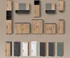 A collection of modern furniture pieces, including cabinets and tall storage units, displayed against a neutral background. Produktbild-Vorschau