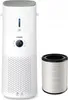 A white Philips air purifier with a replacement filter next to it on a white background. Podgląd zdjęcia produktu