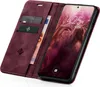 A burgundy flip case for a smartphone is shown open, revealing credit cards and a banknote inside. The smartphone is also visible, displaying the time and date. Produktbild-Vorschau