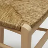 Close-up of a woven seat on a wooden chair. Produktbild-Vorschau