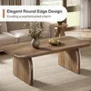 A living room scene with a coffee table and sofa. Anteprima dell’immagine prodotto