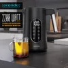 A black electric kettle with a digital display and a glass mug of tea on a kitchen counter. Podgląd zdjęcia produktu