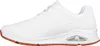 A side view of a white sneaker with a brown sole. Produktbild-Vorschau