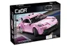 The image shows the retail packaging for a pink toy sports car building set. Voir les images du produit