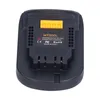 The image shows the back of a black battery adapter with yellow connectors and text labels. Produktbild-Vorschau