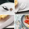 A collage of four images showing different aspects of a cutlery set, including close-ups of a spoon with an acorn, a fork with a waffle, a knife, and a plated meal with cutlery. Produktbild-Vorschau