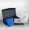 An open watch box with accessories. Produktbild-Vorschau