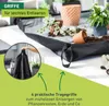 A gardening mat with plants and soil, showing its handles for easy emptying. Produktbild-Vorschau