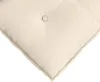 A close-up view of a beige cushion with a button in the center. Anteprima dell’immagine prodotto