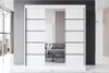 A modern white sliding door wardrobe with black accents is shown in a minimalist interior. Produktbild-Vorschau