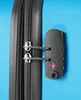 Close-up of a TSA-approved combination lock on a blue suitcase. Náhled obrázku produktu