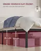 A bed frame with storage boxes underneath, illustrating the space available for storage. Produktbild-Vorschau