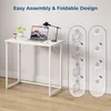 A white desk with a laptop, plant, and coffee cup, with assembly instructions on the right. Produktbild-Vorschau