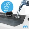 Water being poured into a device, with a measurement indicator. Produktbild-Vorschau