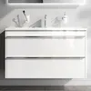 A modern white bathroom vanity with a sink and faucet. Produktbild-Vorschau