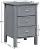 A gray bedside table with three drawers, shown with dimensions indicated by measurement lines and text. Produktbild-Vorschau