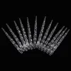 A fan arrangement of clear acrylic icicles against a black background. Podgląd zdjęcia produktu