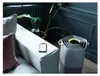 An air purifier is shown next to a sofa in a living room setting, with a smartphone placed on the sofa. Podgląd zdjęcia produktu