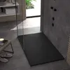 A modern bathroom with a black shower tray, gray tiled walls and floor, and a glass shower enclosure. Náhľad obrázku produktu