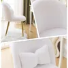 Collage of a white fluffy chair with gold legs, showing different angles and a close-up of a bow cushion. Podgląd zdjęcia produktu