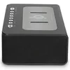 A product shot of a black stereo FM radio alarm clock with a wireless charging pad on top. Produktbild-Vorschau