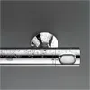 A close-up shot of a chrome shower thermostat with water droplets on its surface. Náhľad obrázku produktu
