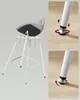 A bar stool with detailed close-ups of its adjustable feet. Náhled obrázku produktu