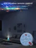 A living room scene with a star projector lamp on a coffee table and a remote control in the foreground. Náhled obrázku produktu