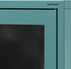 A close-up of a teal cabinet door with a black screen embedded in it. Podgląd zdjęcia produktu