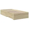 A single bed frame with a drawer, shown from a side angle against a white background. Podgląd zdjęcia produktu