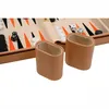 A close-up view of a backgammon set, showing dice cups and part of the board. Podgląd zdjęcia produktu