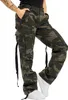 A person wearing camouflage cargo pants and white sneakers. Náhľad obrázku produktu
