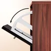 A close-up view of a shoe cabinet mechanism, showing how a flap opens outwards. Produktbild-Vorschau