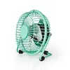 A teal colored desk fan is shown against a white background. Podgląd zdjęcia produktu