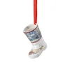 A ceramic Christmas boot ornament with a winter scene decoration. Produktbild-Vorschau