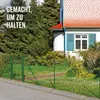 A green wire fence with a gate in front of a house and trees. Produktbild-Vorschau